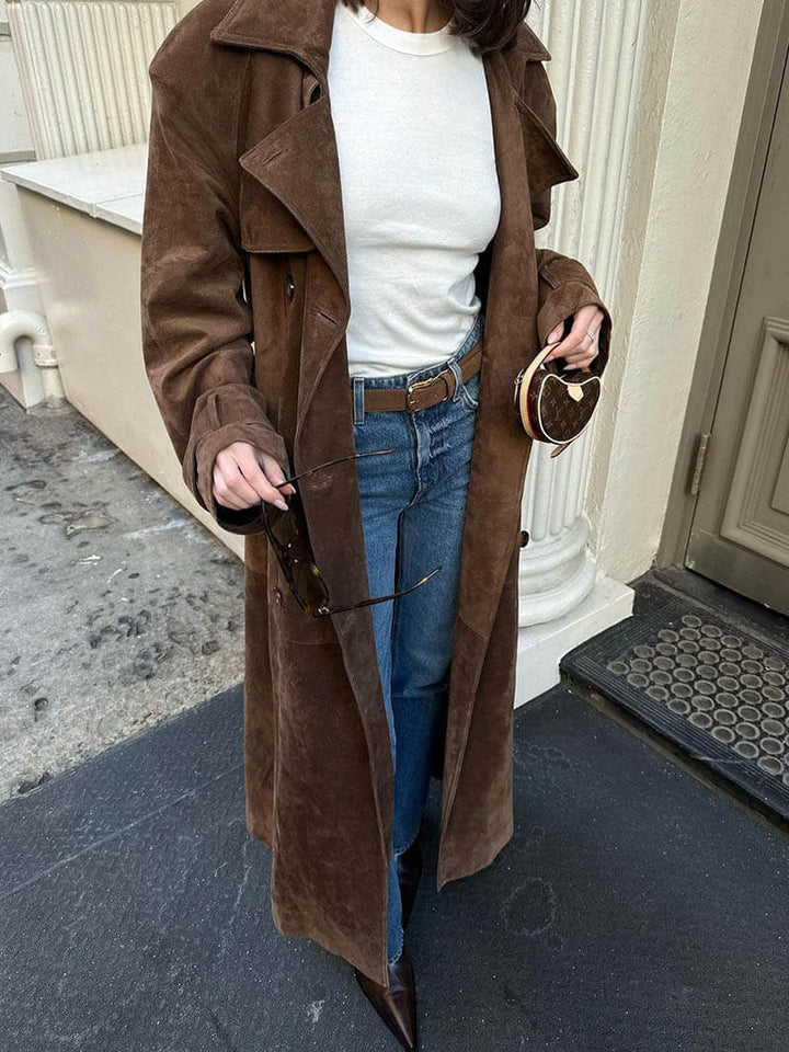 Stylish women's brown trench coat with a belted waist and classic lapel collar, fashion outerwear