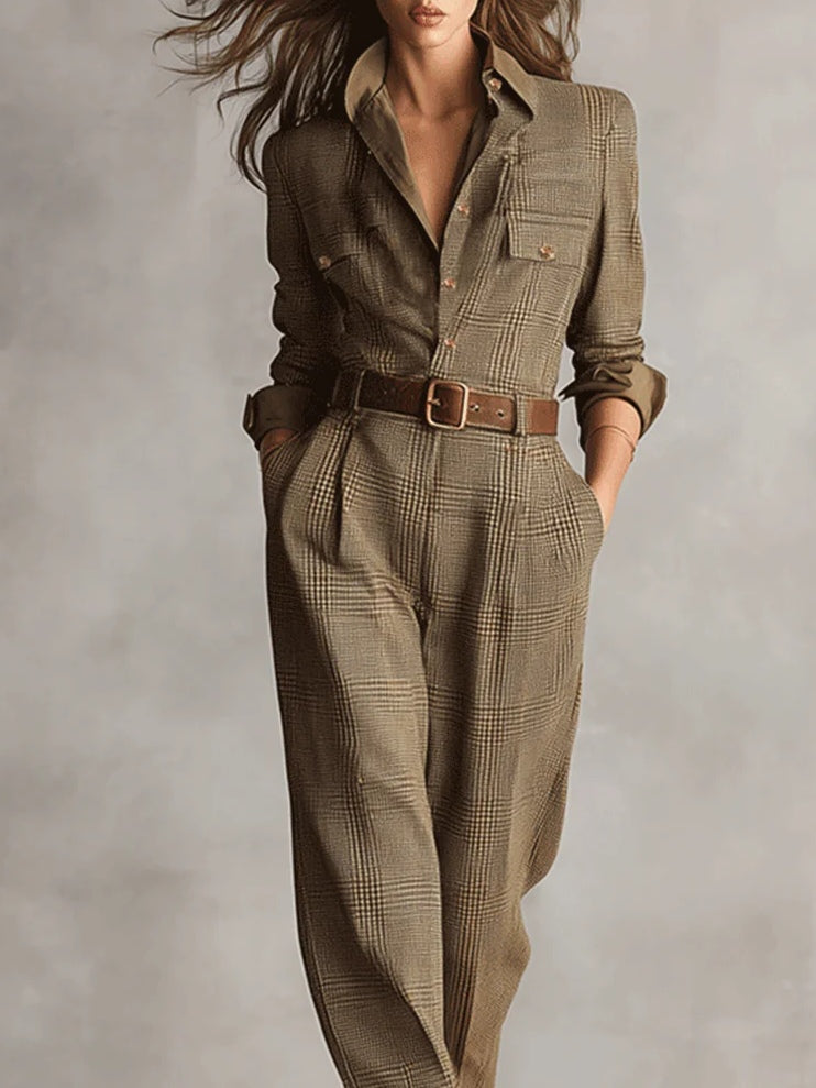 Full length women's jumpsuit featuring a stylish checked pattern and utility design, belted for a flattering fit