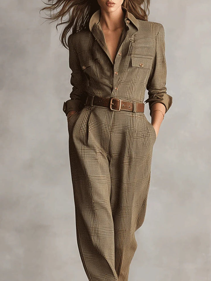 Full length women's jumpsuit featuring a stylish checked pattern and utility design, belted for a flattering fit