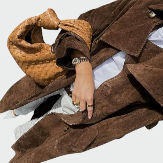 Stylish women's trench coat, a must-have elegant outerwear piece for fall.