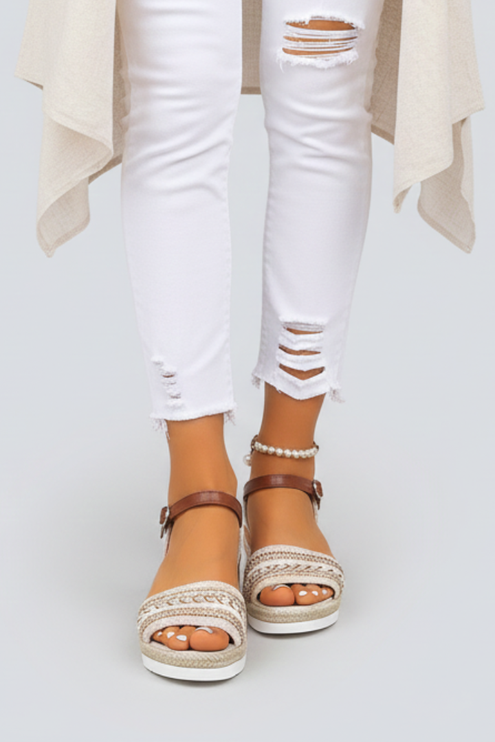 Women's sophisticated brown strappy high-heel summer sandals, ideal for dress occasions.