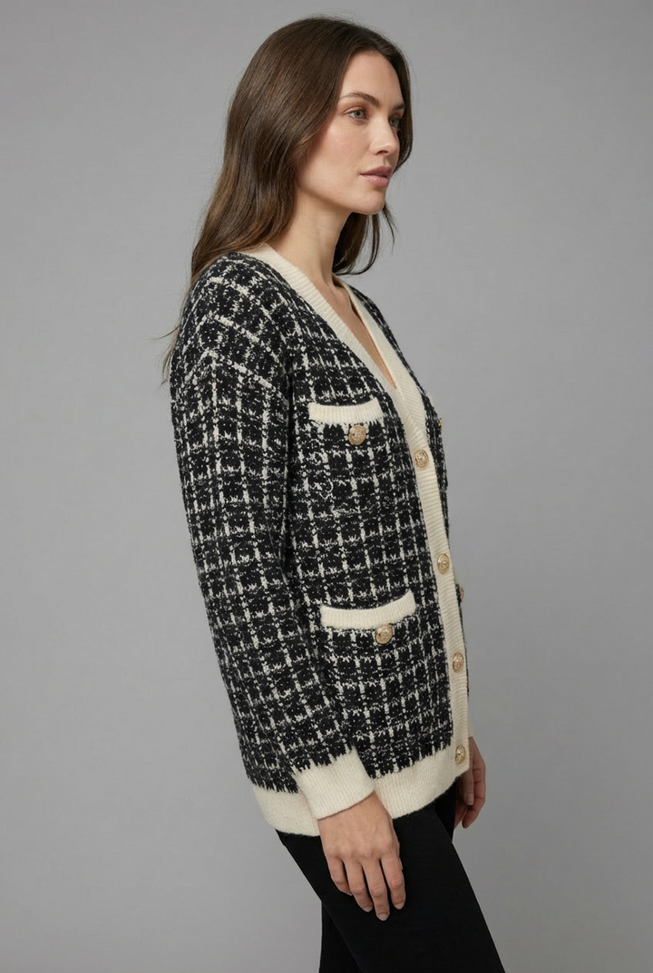 Women's stylish button-front cardigan, an elegant V-neck top for versatile layering in cold weather.