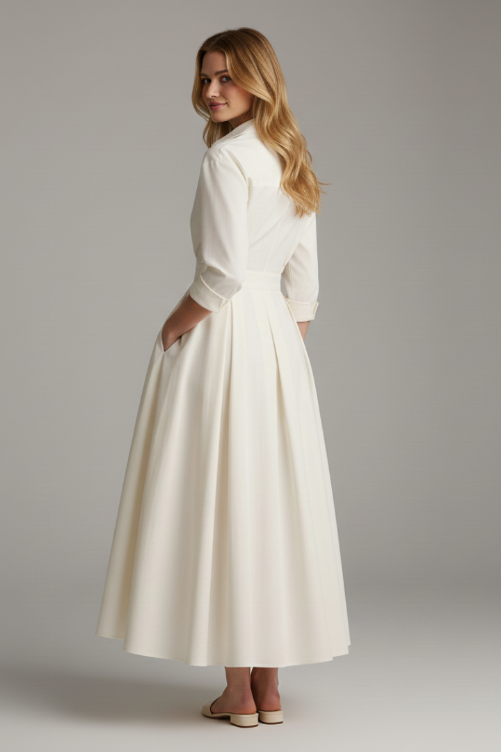 Full shot of a model wearing a chic women's button front collared midi dress, ideal for day wear