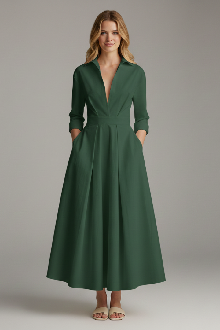 Detailed back view of a women's button front collared midi dress, showcasing the flared skirt