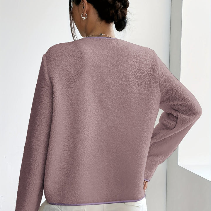 Modern elegant women's button-front jacket, perfect for contemporary fall & winter looks.