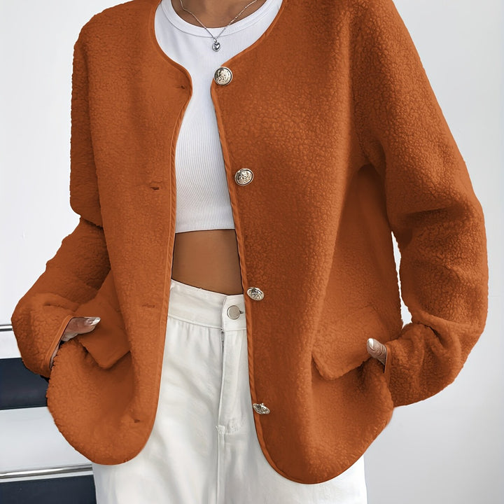 Timeless women's elegant button-front jacket, offering comfort & style for fall & winter.