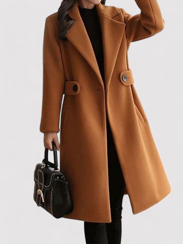 Detail of the belt on a women's camel wool blend winter coat, emphasizing the cinched waist design