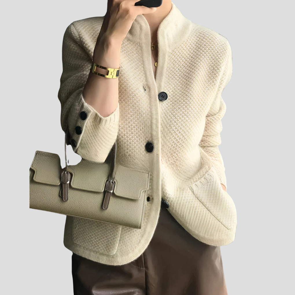 Elegant women's cashmere button-front cardigan in a neutral shade, perfect for stylish layering.