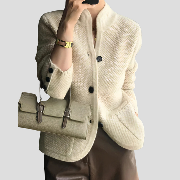 Elegant women's cashmere button-front cardigan in a neutral shade, perfect for stylish layering.