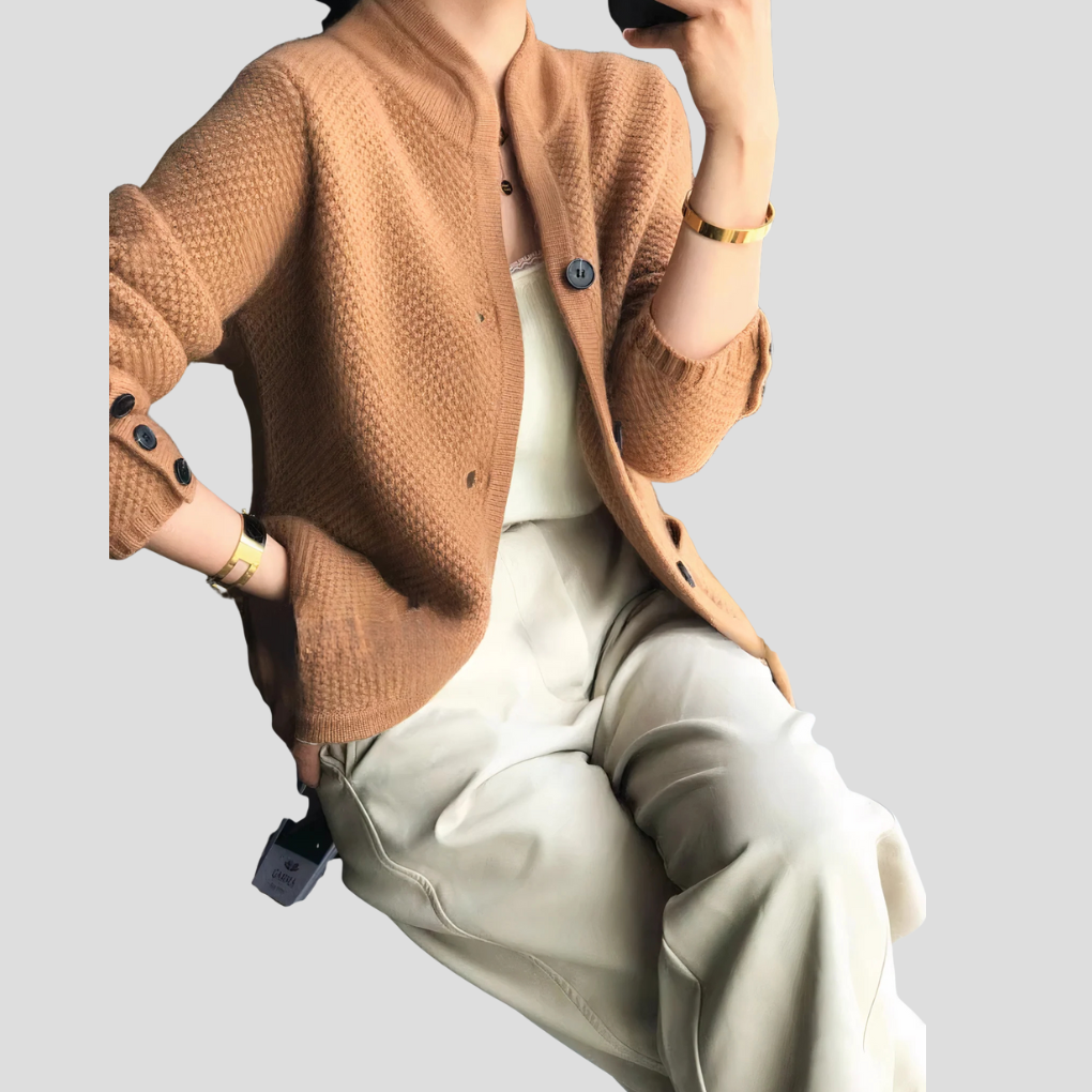 Soft cashmere women's knitwear sweater with delicate button-front detail, an elegant wardrobe essential.