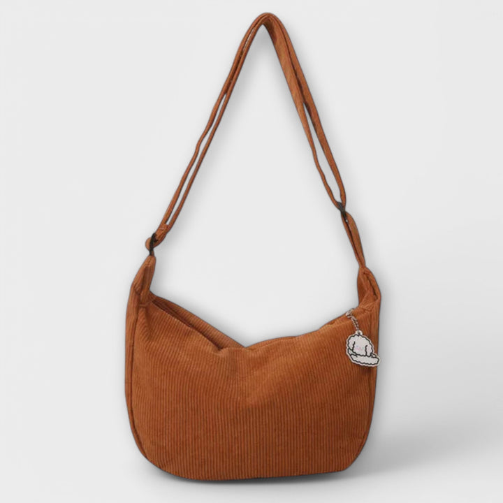Collection of women's chic curved shoulder bags in various colors, versatile fashion accessories.