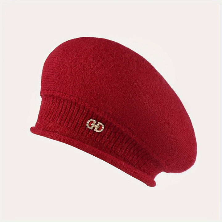 Sophisticated women's knitted beret hat, a warm and chic choice for timeless winter headwear.
