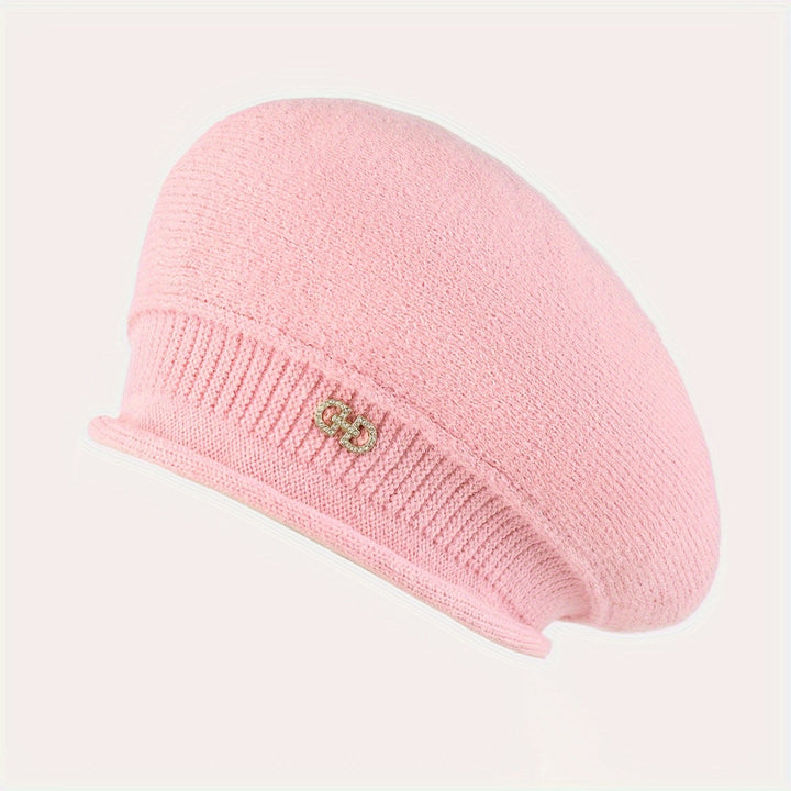 Hand-knitted style women's beret, a warm winter hat that blends comfort with elegant fashion.
