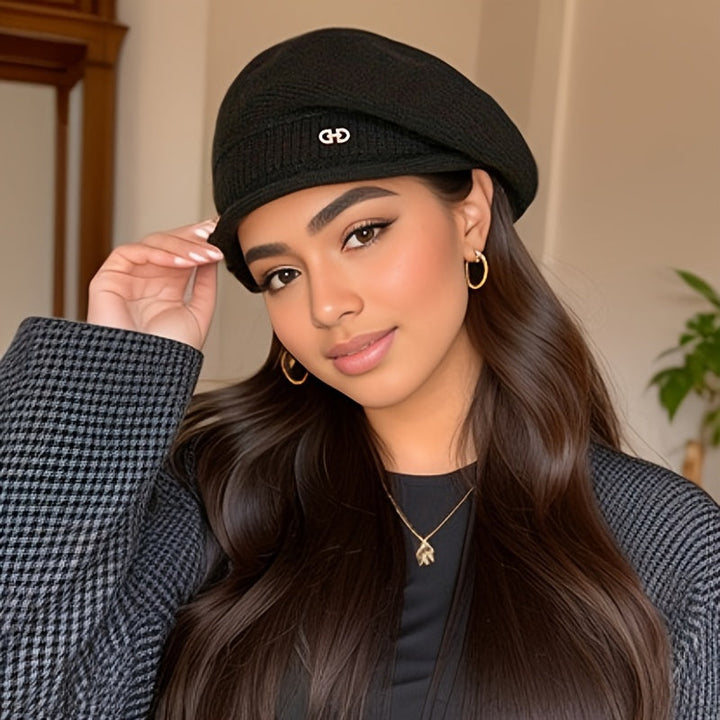 Fashionable women's beret hat, finely knitted for warmth and a classic, elegant winter style.