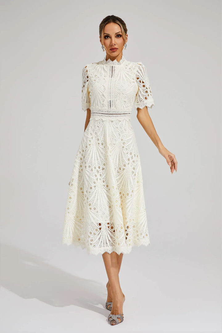 Women's elegant lace midi dress, featuring a flattering silhouette.