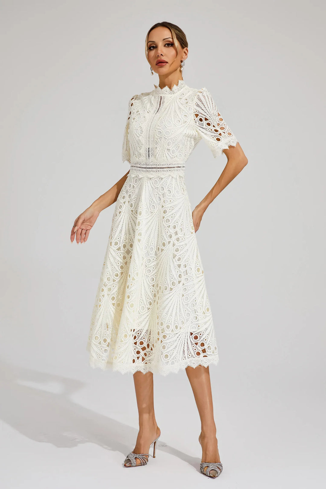 Designed for women, a chic lace midi dress for sophisticated events.