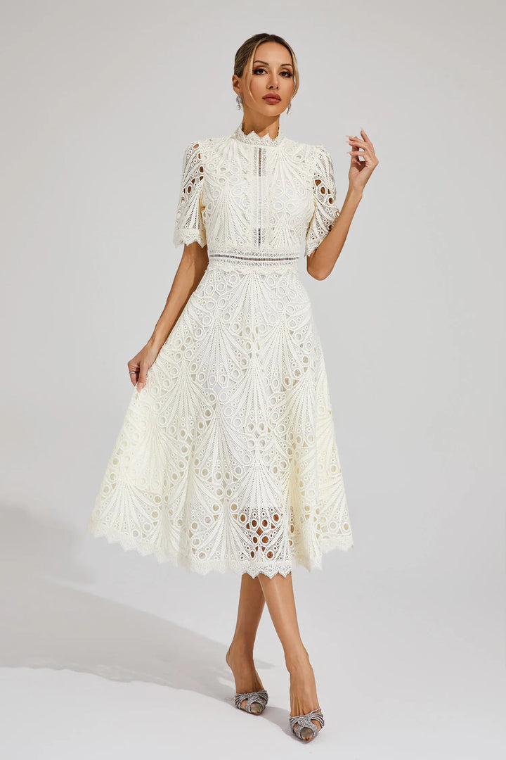 Stylish women's lace midi cocktail dress, embodying feminine elegance.