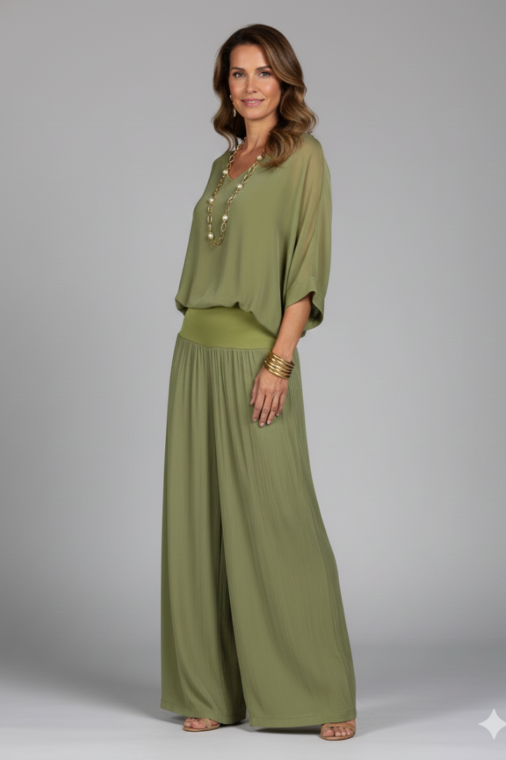 Fashionable women's summer outfit: a V-neck chiffon top and wide-leg pants in a cohesive set.