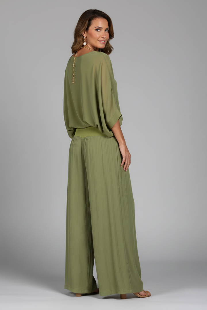 Chic women's two-piece set with a V-neck top and wide-leg chiffon pants, ideal for elegant wear.