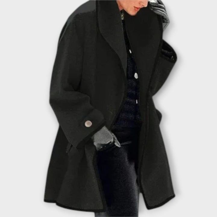 Fashionable women's belted trench coat in a timeless classic style, perfect as a spring jacket.