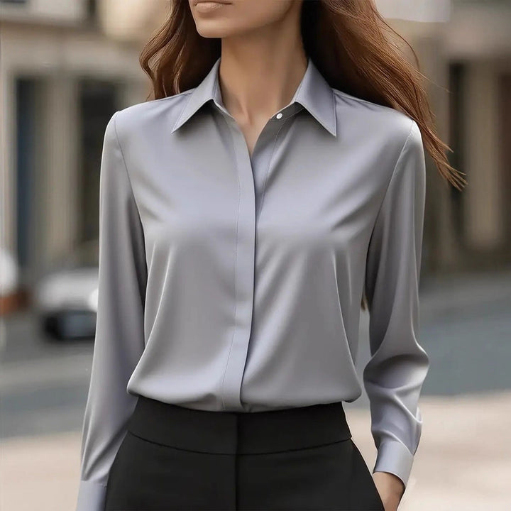 Timeless women's versatile blouse, long sleeve button-up, chic for office or casual.