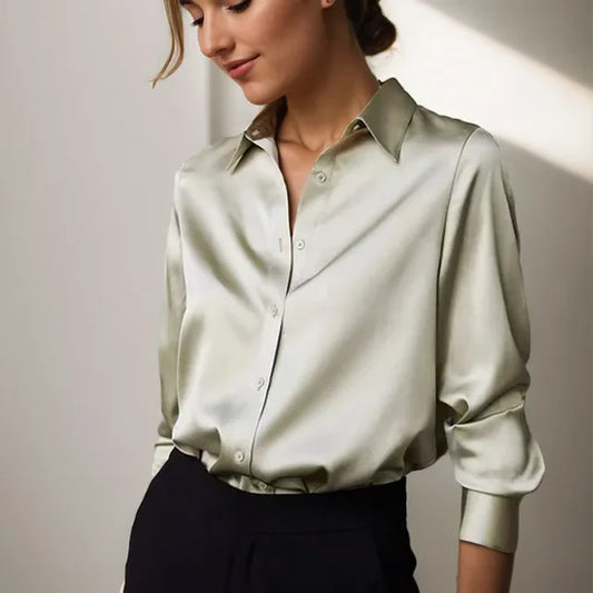 Elegant women's classic button-down blouse, long sleeve, perfect for workwear or casual summer outfits