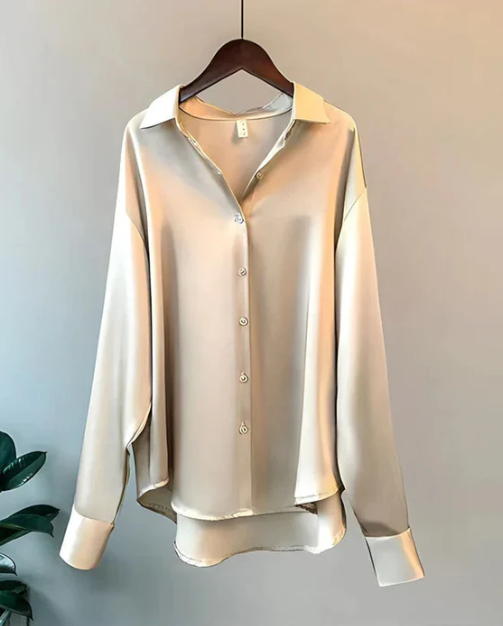 Stylish women's button-down blouse, a classic long sleeve top suitable for elegant workwear