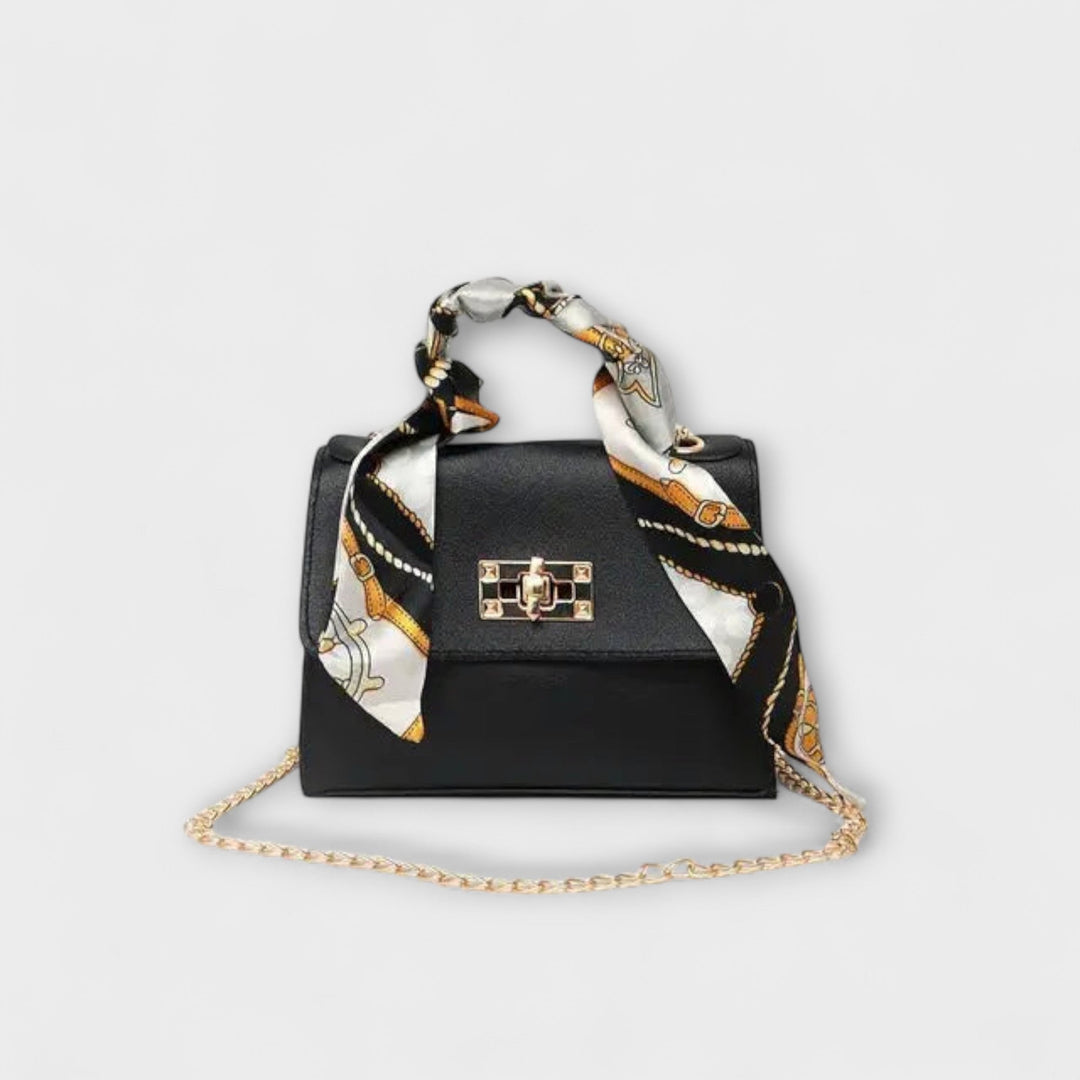 Elegant women's classic chain handbag, perfect for a chic summer look or evening accessory