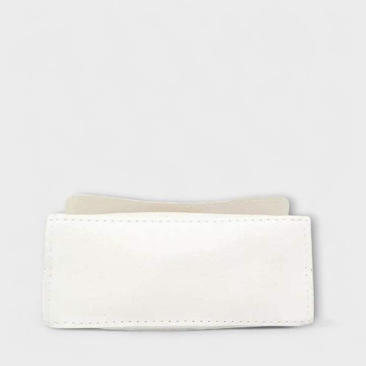 Structured women's crossbody handbag with gold chain strap, a timeless fashion accessory