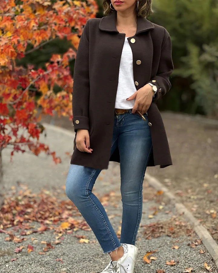 Classic black mid-thigh women's coat, oversized fit for elegant winter wear