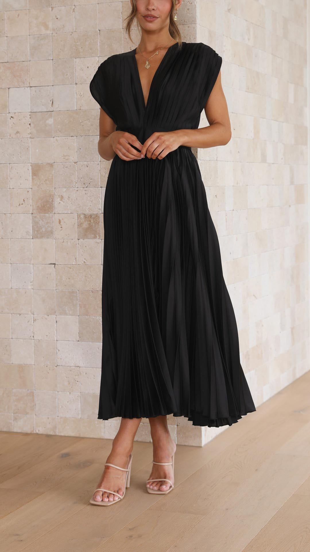 Long pleated summer dress with a stylish v-neck for women.