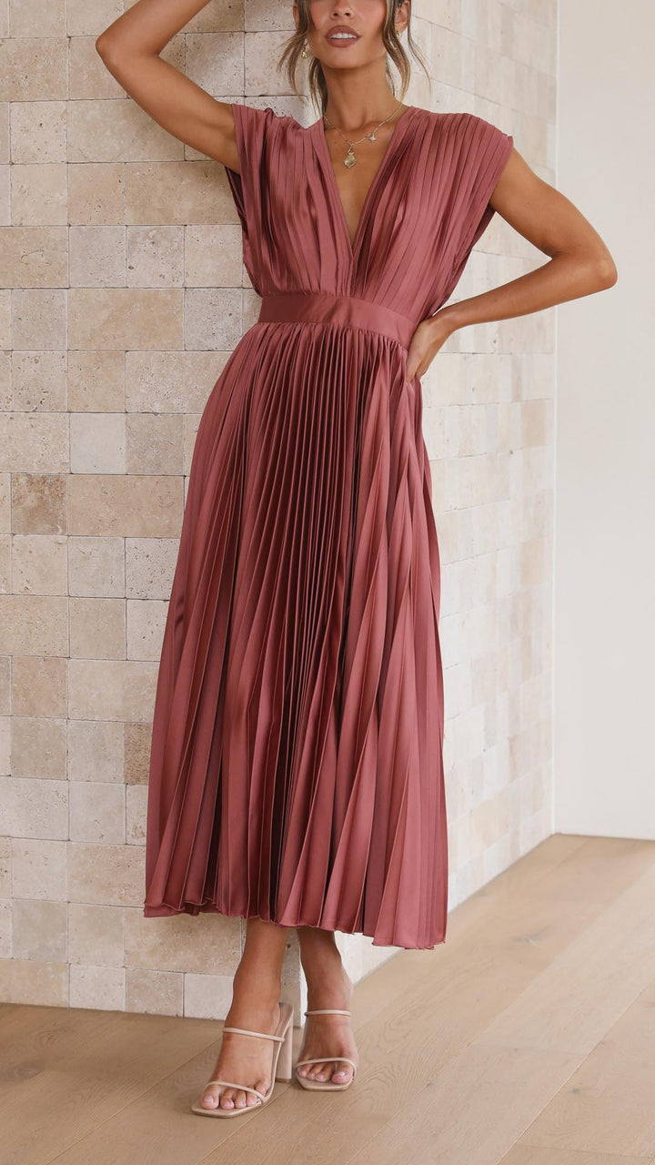 Flowy women's long pleated v-neck dress in a classic style.
