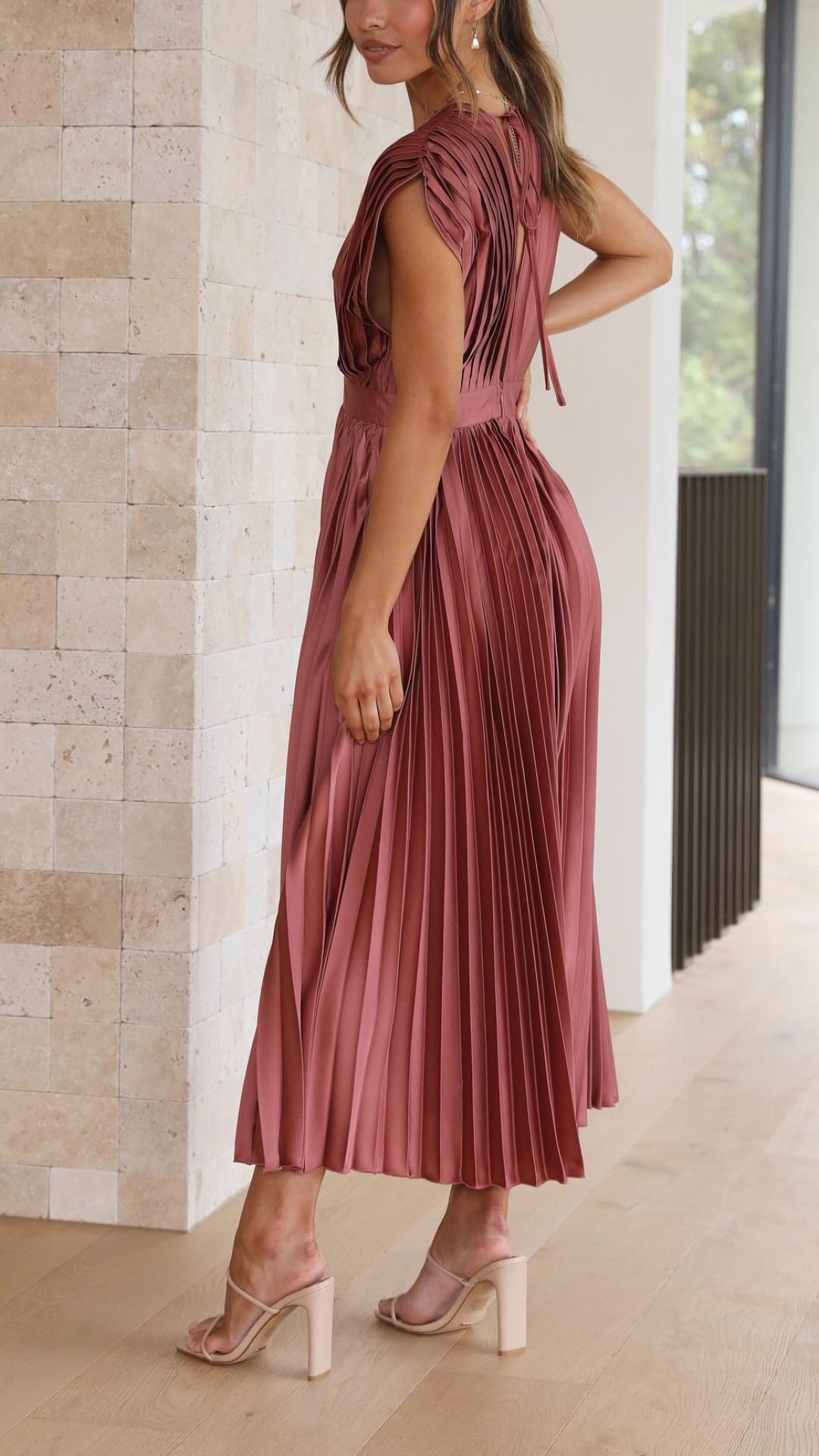 Women's summer pleated maxi dress with a flattering v-neckline.