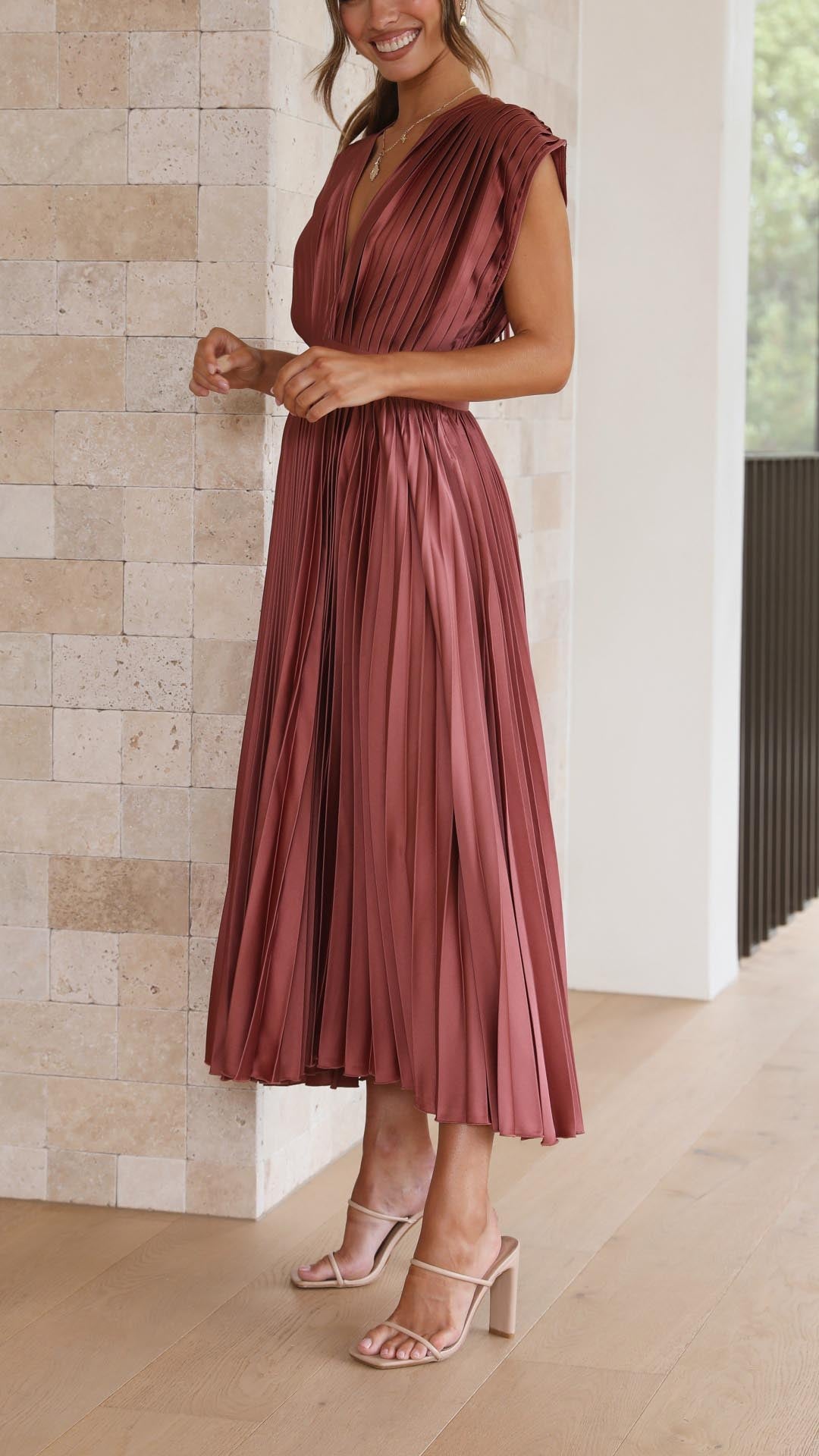 Classic pleated v-neck long dress, an elegant choice for women.