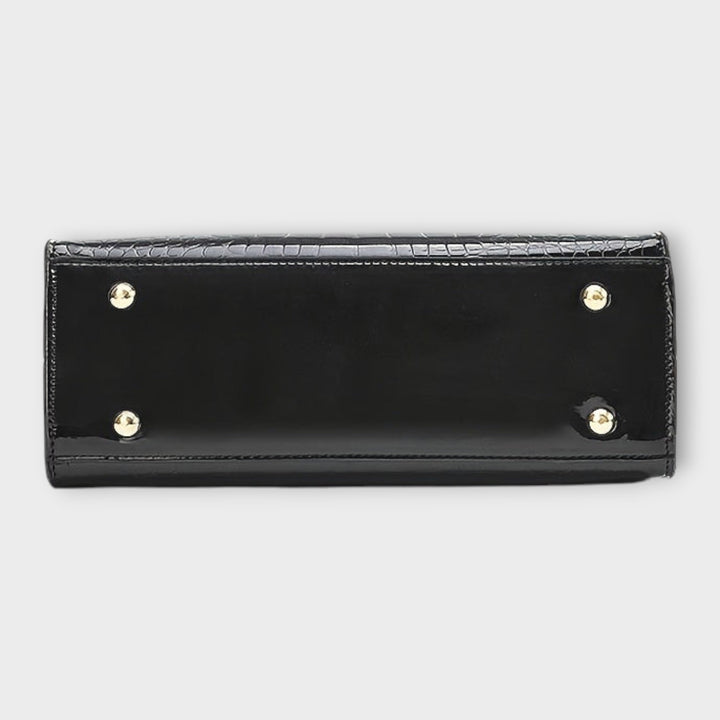 Designer quality women's structured bag, featuring a timeless design suitable for both shoulder and crossbody wear.