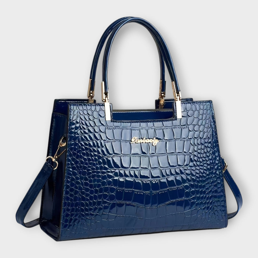 Fashion handbag: women's classic structured bag, offering both elegance and practicality as a shoulder or crossbody bag.
