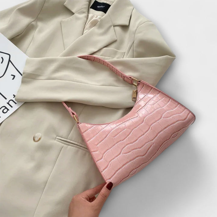 Chic women's shoulder bag, an elegant textured accessory designed for the modern woman.