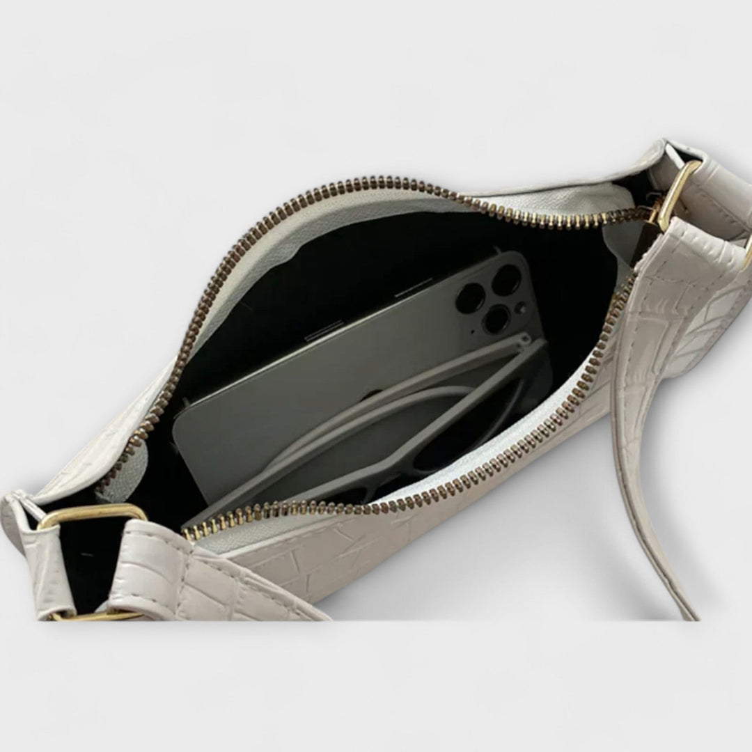 Timeless women's shoulder bag, textured design for a sophisticated and elegant look.