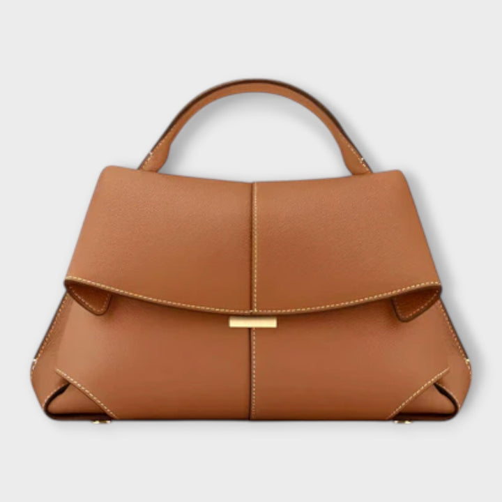 Chic women's top handle handbag, featuring a structured design for an elegant everyday carry.