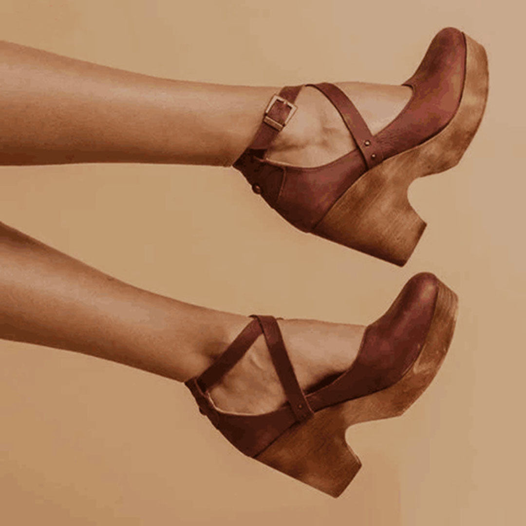 Comfortable black wedge heels for women, ideal for elegant office or evening attire