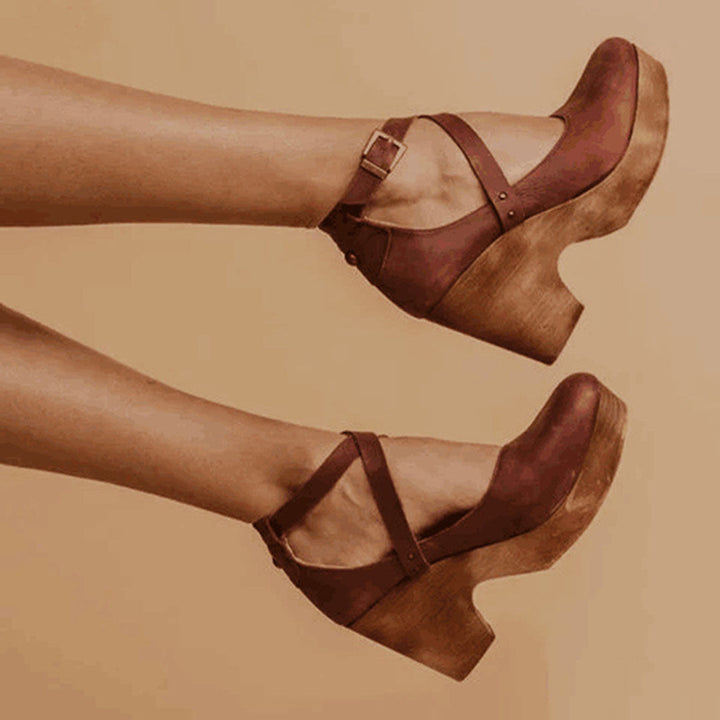 Comfortable black wedge heels for women, ideal for elegant office or evening attire