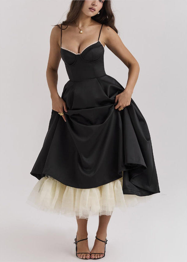 Chic women's corset midi dress featuring a full skirt. Versatile and elegant for spring and summer events.