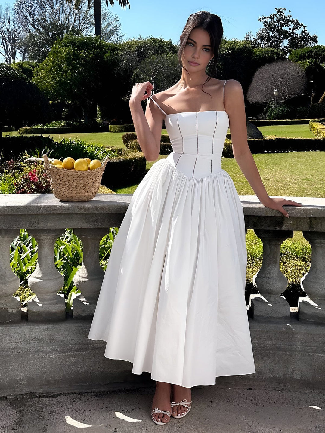 Stylish women's wedding guest dress, featuring a classic corset design and modern midi length.