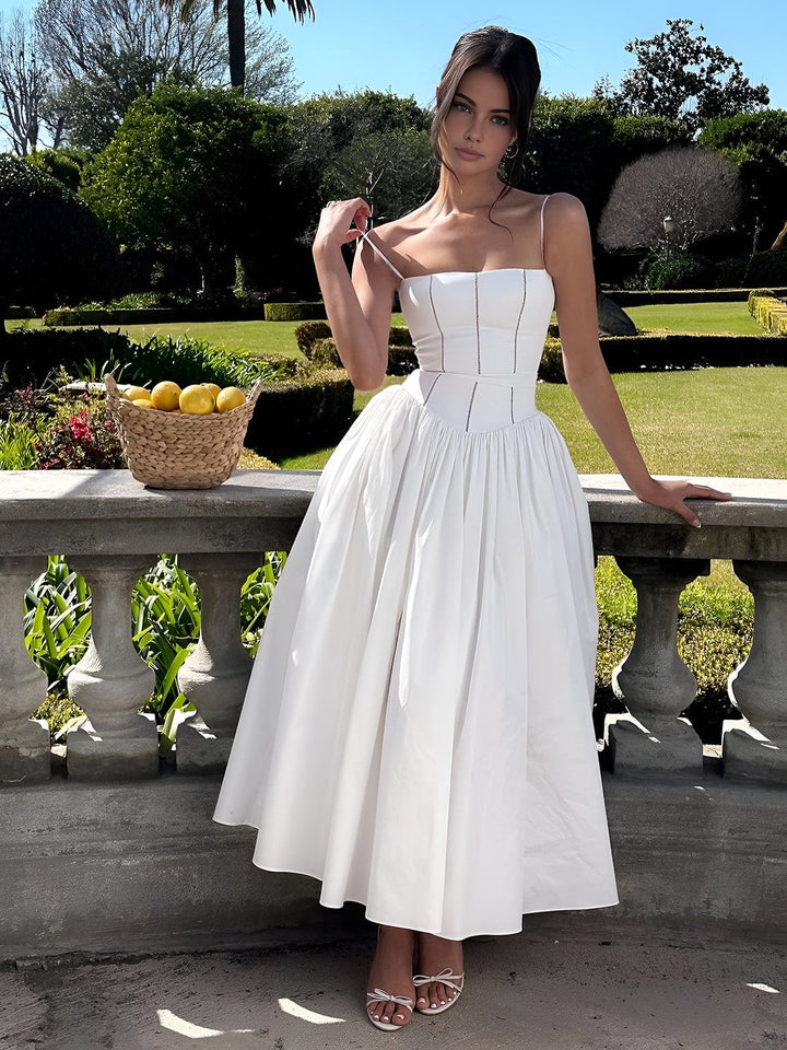 Stylish women's wedding guest dress, featuring a classic corset design and modern midi length.