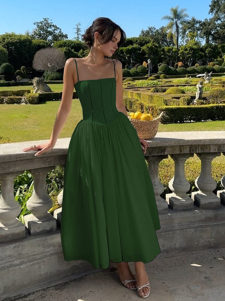 Timeless women's formal dress for wedding guests, with a flattering corset top and midi silhouette.