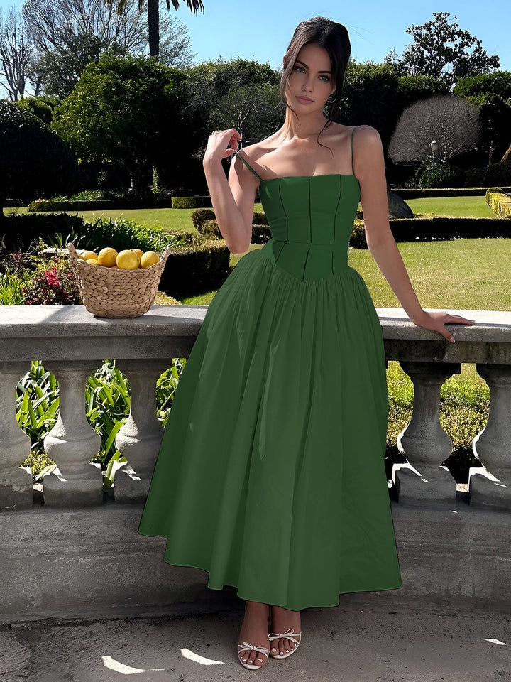 Beautiful women's elegant midi dress, designed with a trendy corset for an upscale evening look.