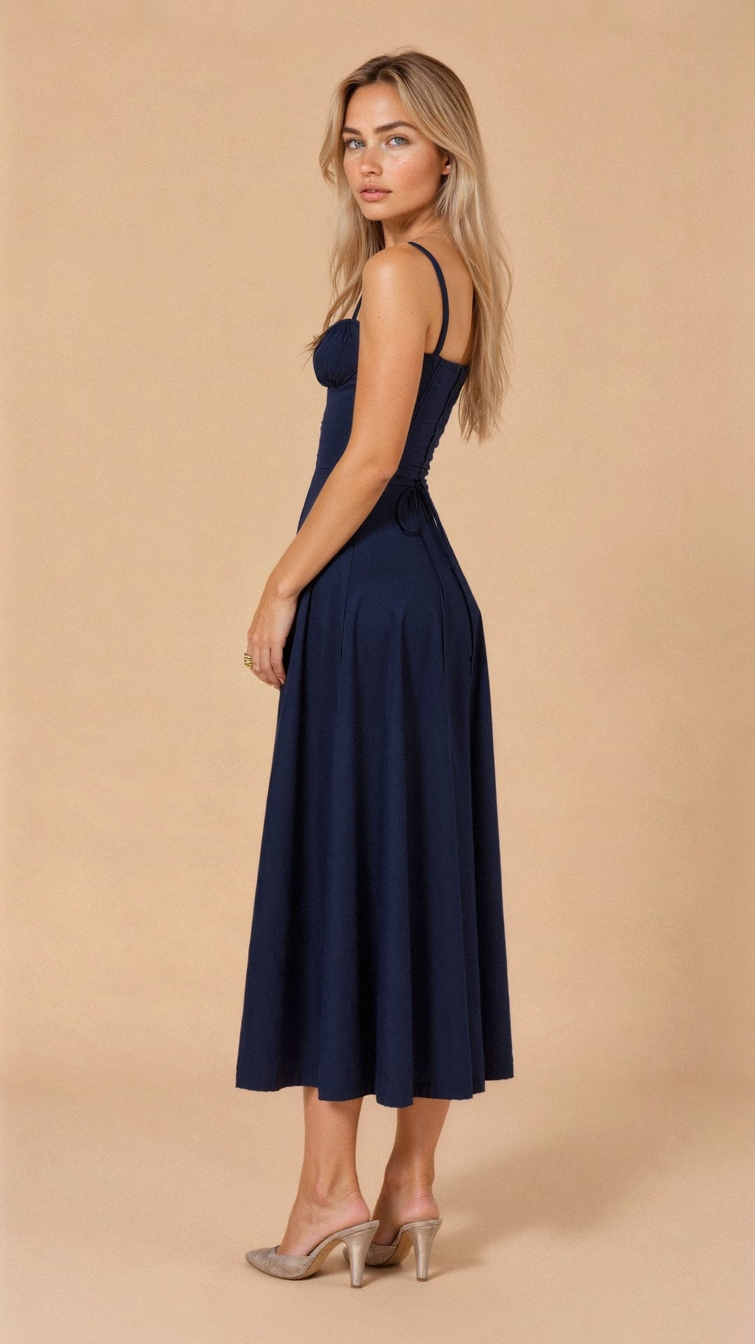 Formal women's party midi dress featuring a refined corset and a cascading flowing skirt