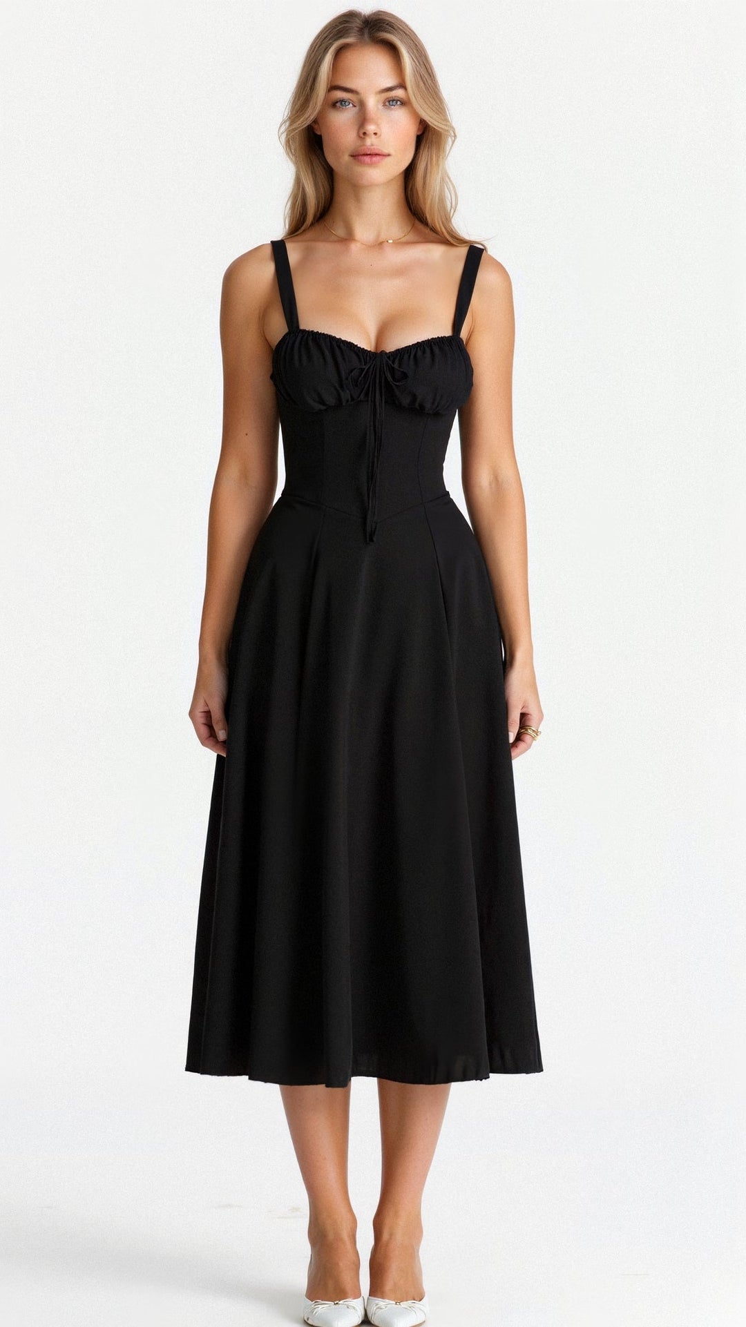 Close-up of the corset detailing on a women's elegant midi dress with flowing skirt