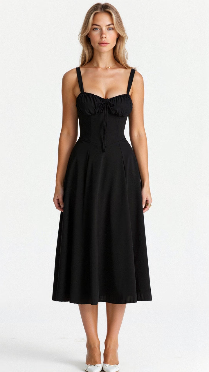 Close-up of the corset detailing on a women's elegant midi dress with flowing skirt