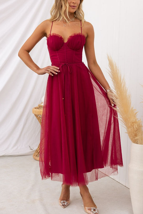 Statement women's evening wear: Elegant corset tulle midi dress, perfect for grand entrances.